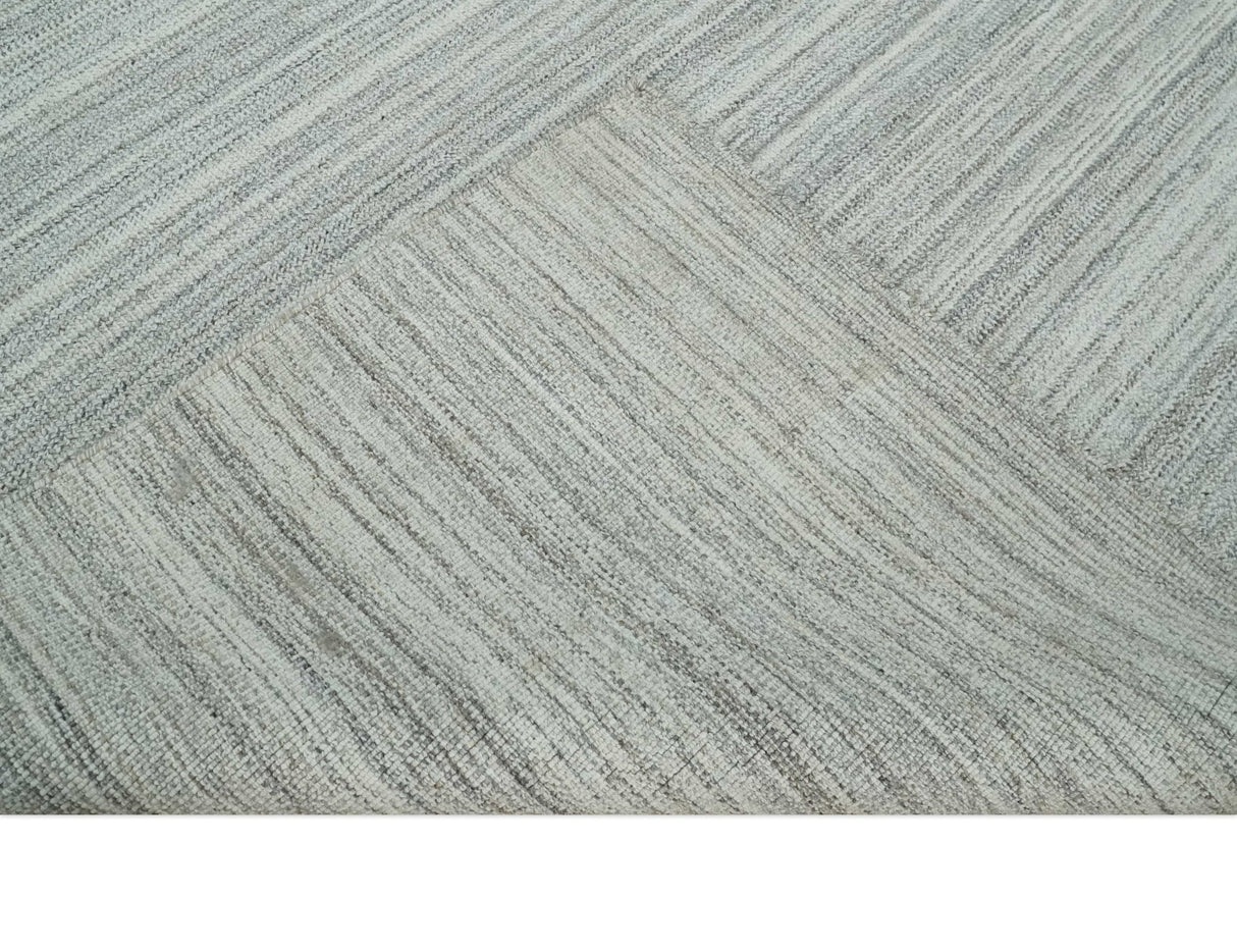 8x10 Hand Made Solid Ivory and Brown Blended Wool Flatwoven Area Rug