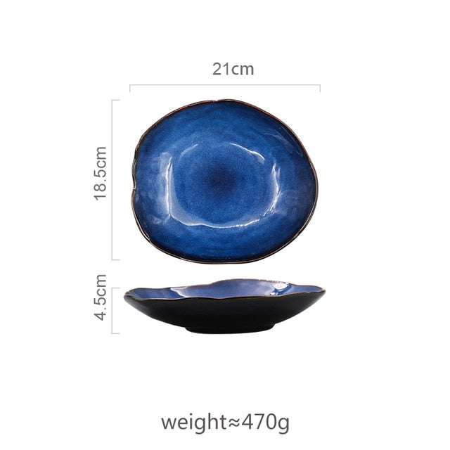 Atlas Dinner Plate, medium, 21cm wide, with a deep blue glazed top and black ceramic base.