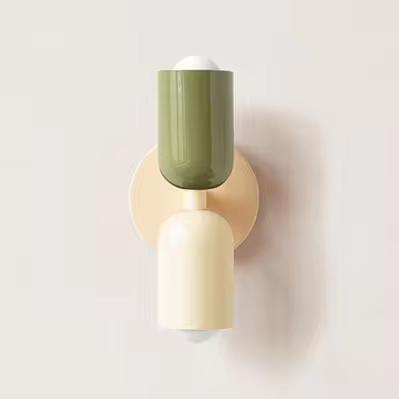 Mura Wall Light, a modern two-tone wall sconce with an olive green and cream cylindrical design.