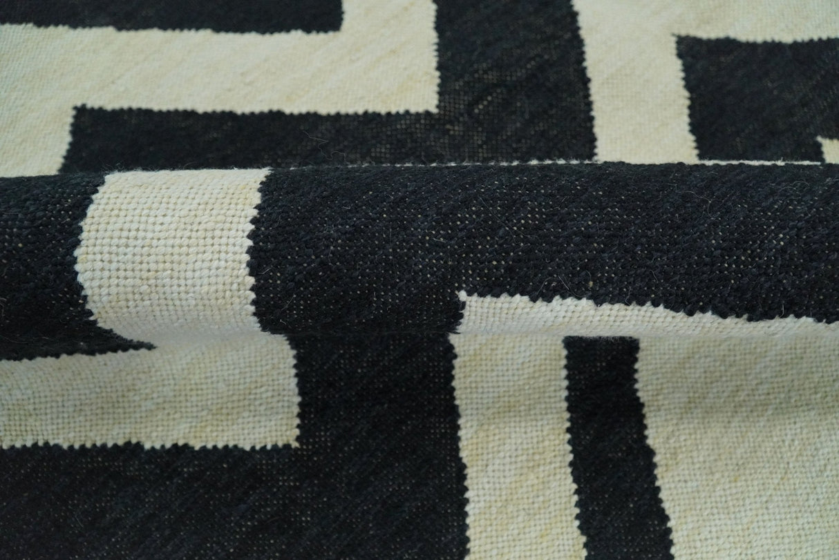 Black and Beige Chevron Design Hand Woven Dhurrie Rug