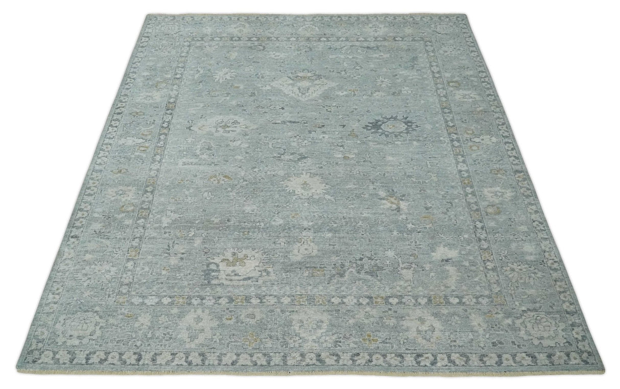 Distressed finished 8x10 Gray and Silver Low Pile wool Rug