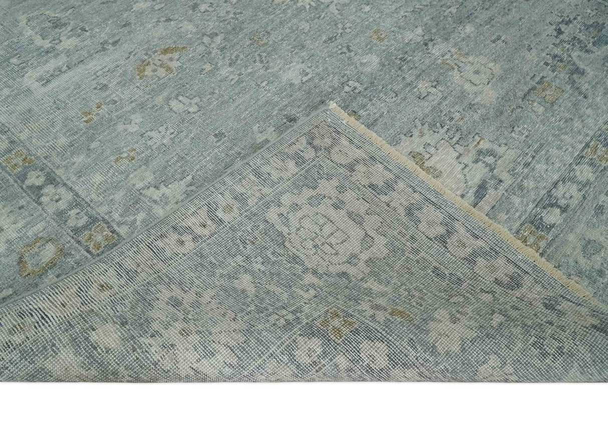 Distressed finished 8x10 Gray and Silver Low Pile wool Rug