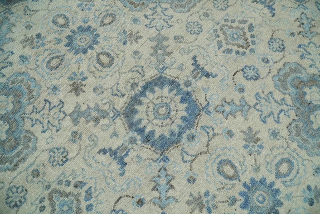 Hand Knotted Traditional Ivory and Blue Oxidized Textured Low Pile Wool Rug