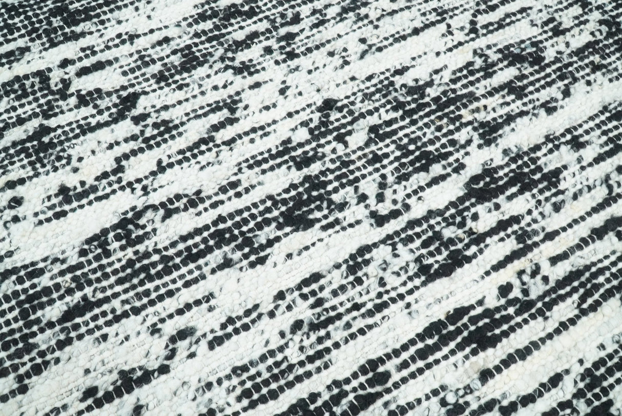 Hand Made 5x8 Black and Ivory Wool Area Rug