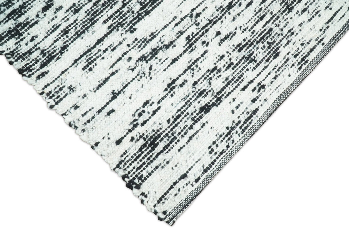 Hand Made 5x8 Black and Ivory Wool Area Rug