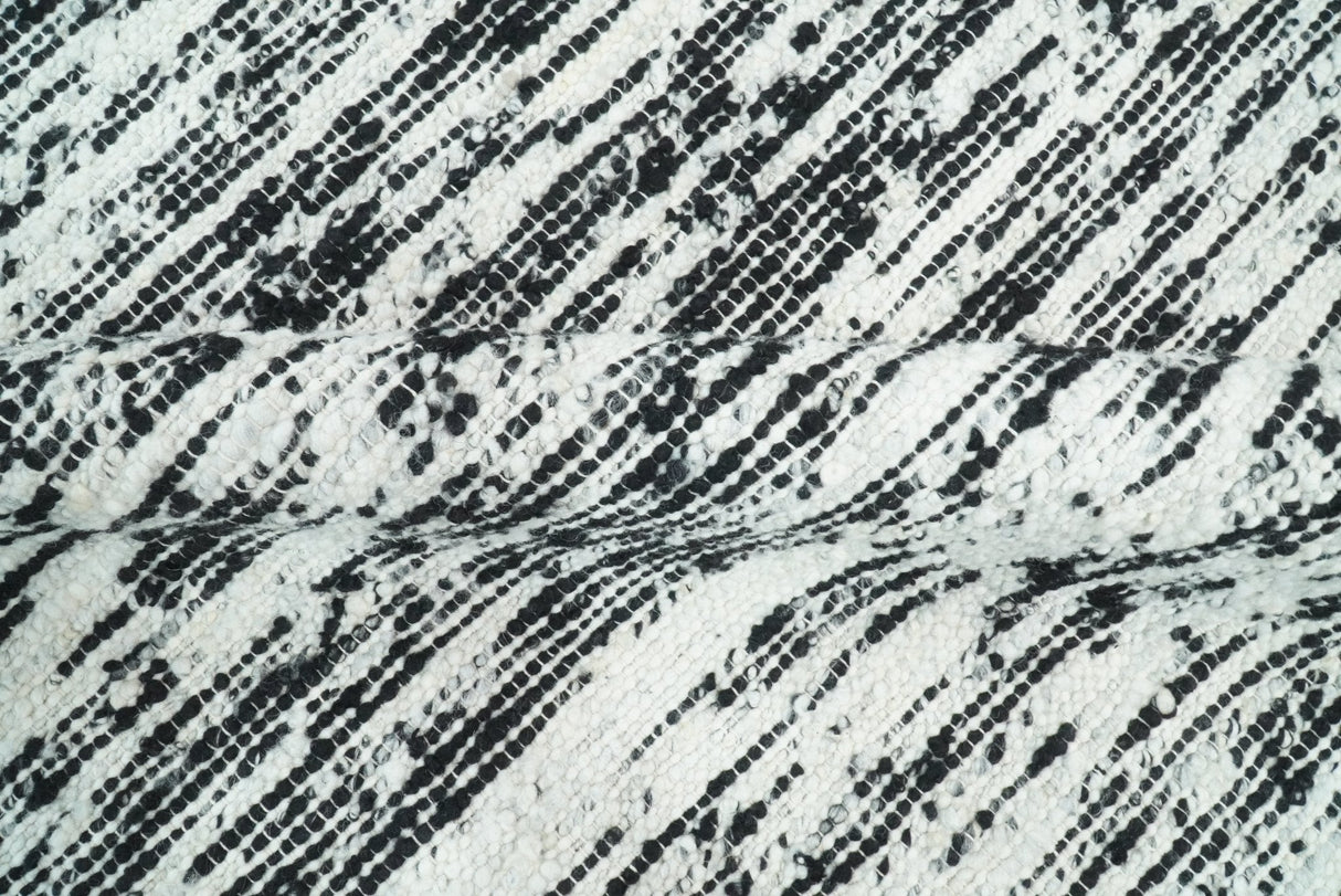 Hand Made 5x8 Black and Ivory Wool Area Rug