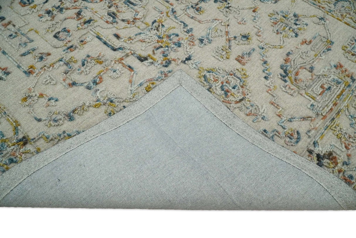 Hand Tufted 5x8 Beige and Blue Wool Textured Loop Area Rug