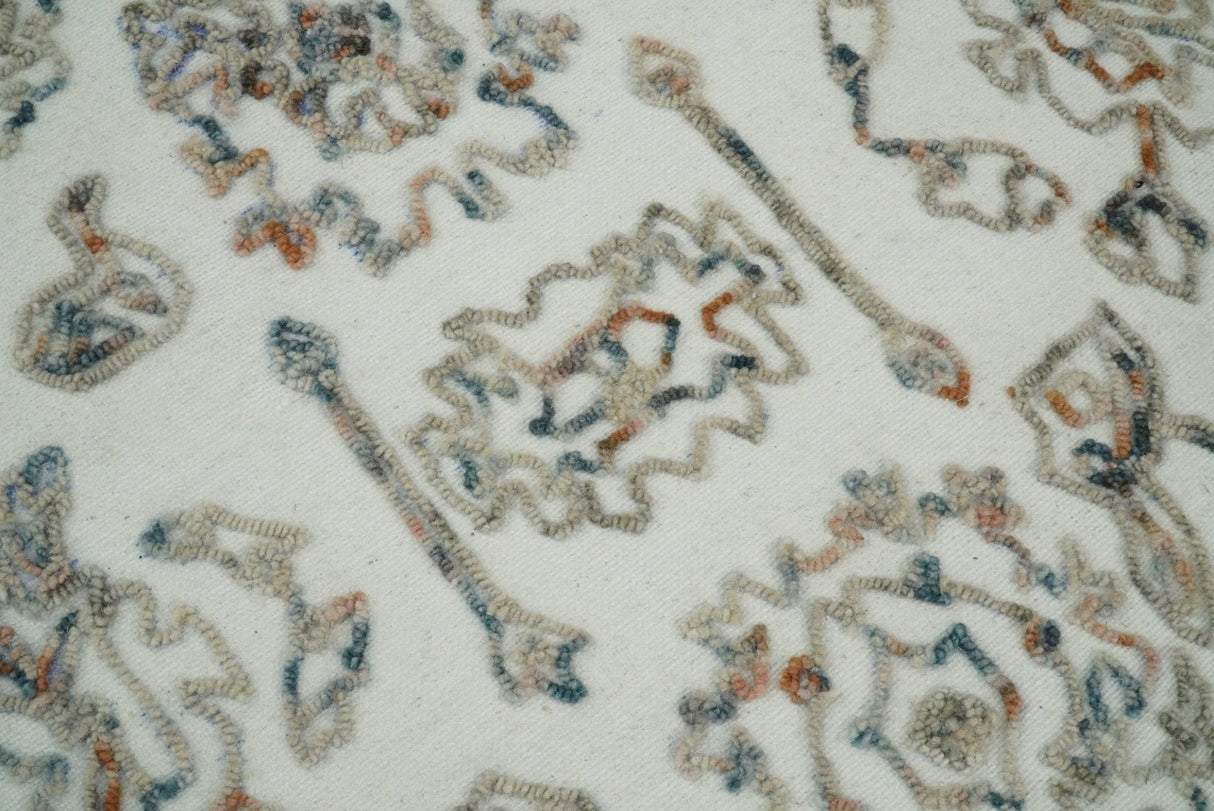 Modern Ivory And Blue Hand Tufted 5x8 Wool Textured Loop Area Rug