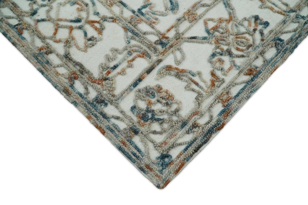 Modern Ivory And Blue Hand Tufted 5x8 Wool Textured Loop Area Rug