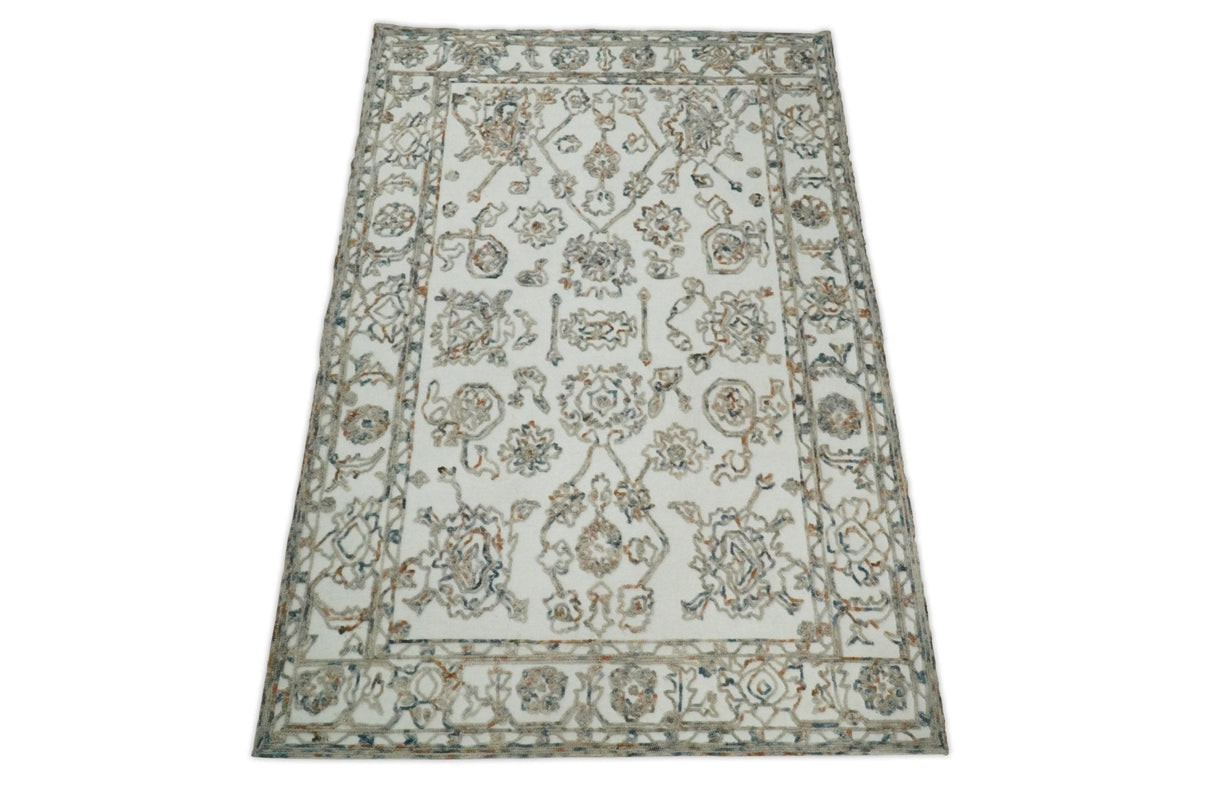 Modern Ivory And Blue Hand Tufted 5x8 Wool Textured Loop Area Rug