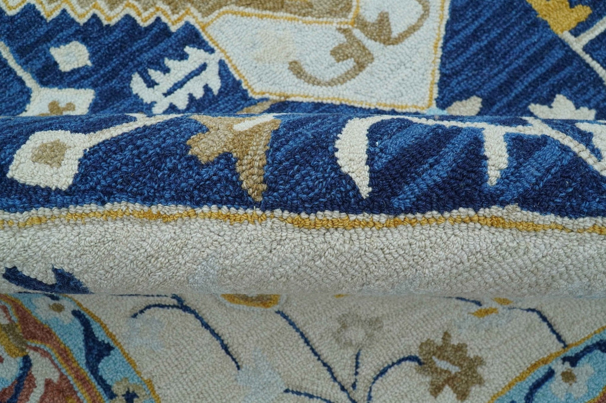 Ollie Traditional Blue And Ivory Hand Tufted Wool Rug