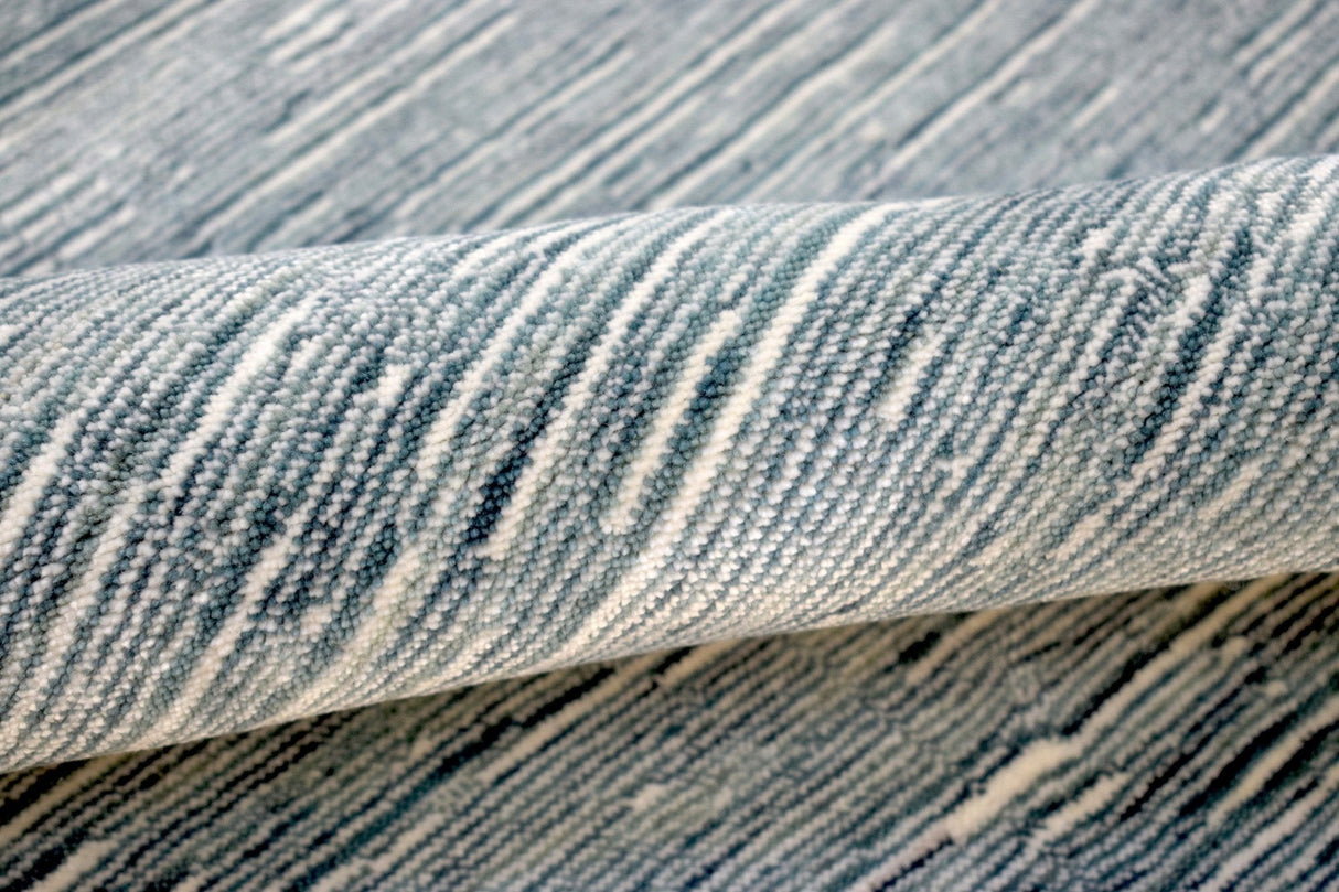 Solid Blue and Silver Wool And Viscose 5x8 Area Rug