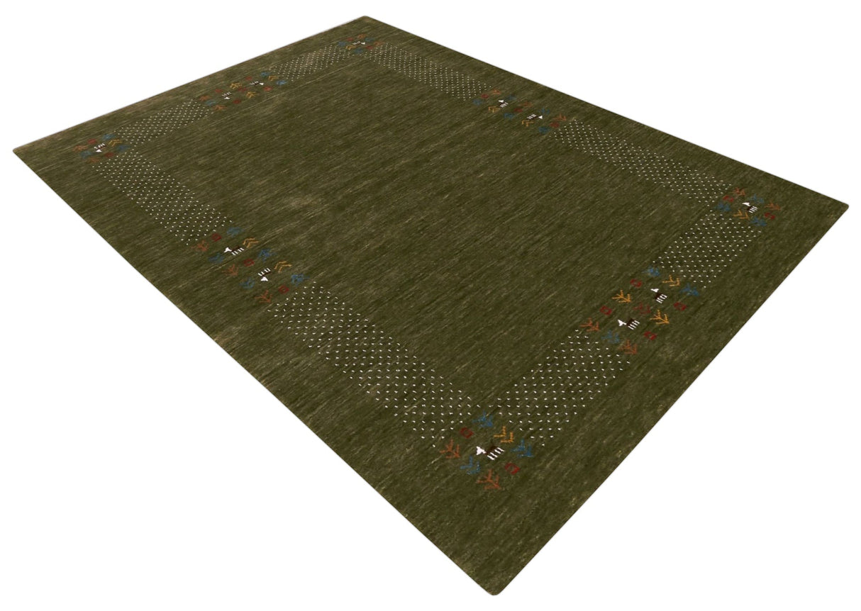 Solid with Border Patterns Hand Loomed Wool Area Rug