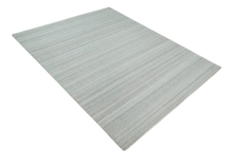 8x10 Hand Made Solid Ivory and Brown Blended Wool Flatwoven Area Rug