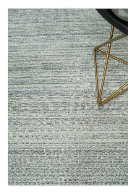 8x10 Hand Made Solid Ivory and Brown Blended Wool Flatwoven Area Rug