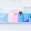 Chameleon Avenue Wall-Mounted Magazine Shelf, 30cm, clear acrylic with blue tint, holding books.