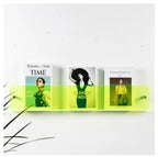 Neon Avenue Wall-Mounted Magazine Shelf, 30cm, holding three magazines.