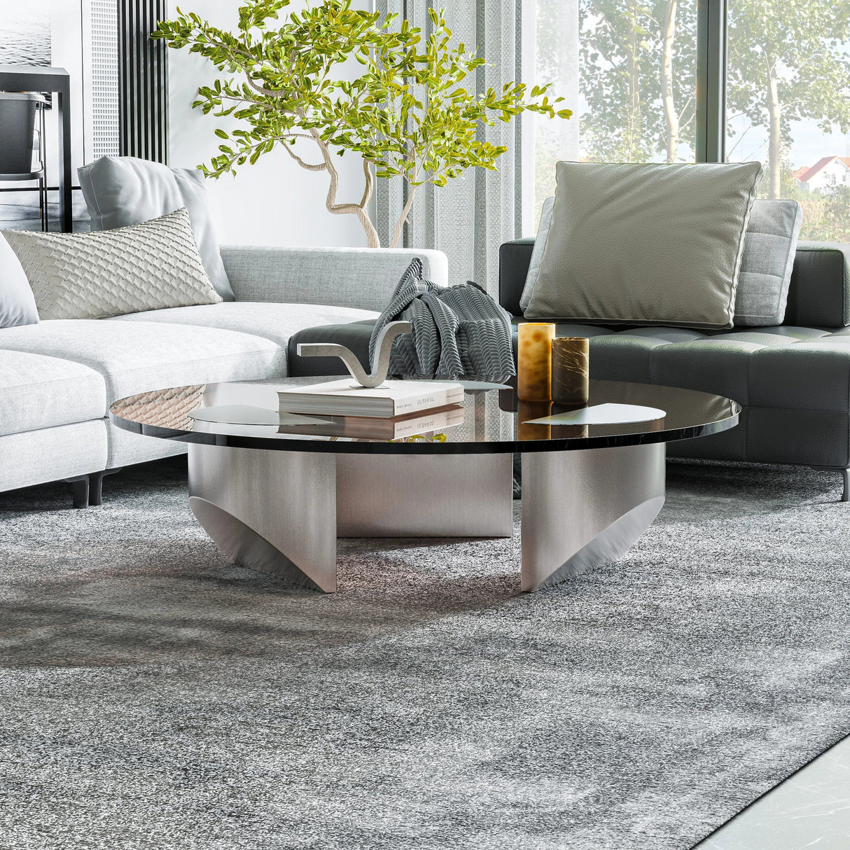 Bassano coffee table with a round dark glass top and light silver curved base in a modern living room.
