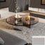 Bassano coffee table with round bronzed glass top and brushed steel base.
