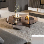 Bassano coffee table with round bronzed glass top and brushed steel base.