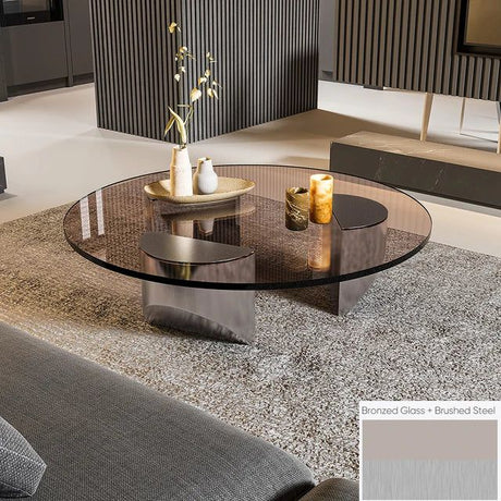 Bassano coffee table with round bronzed glass top and brushed steel base.