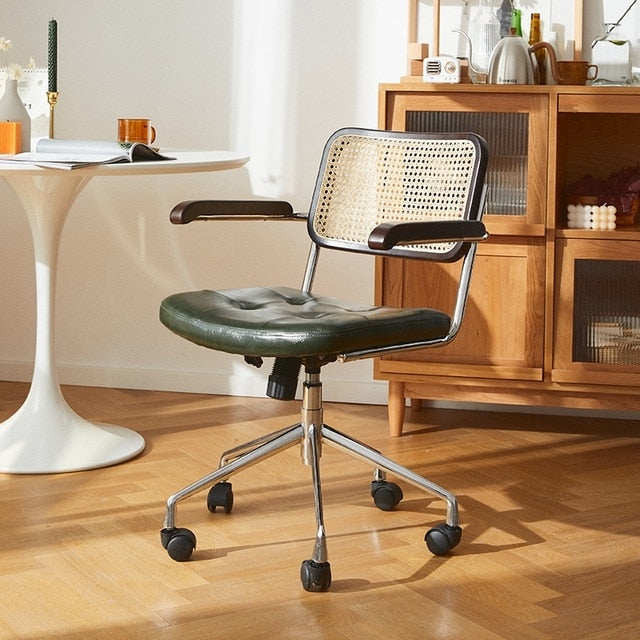Lox Office Chair in olive green with cane back, dark wood arms, and chrome base with wheels.