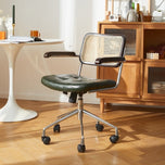 Lox Office Chair in olive green with cane back, dark wood arms, and chrome base with wheels.