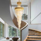Gold Medford Crystal Chandelier, 50x150cm, with tiered glass rods, hanging in a modern spiral staircase.