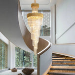 Gold Medford Crystal Chandelier, 50x150cm, with tiered glass rods, hanging in a modern spiral staircase.