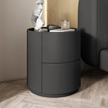 Mira black bedside table with two drawers, a round top, and a modern design.