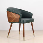 Modenal Dining Chair in olive solid upholstery with walnut wood back and tapered legs with brass caps.