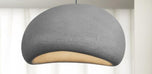 Nara pendant light, 12 inch dark gray stone-like fixture with a curved, organic shape.