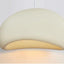 Nara Pendant Light, 12 inch cream organic-shaped fixture with textured surface and soft glow.
