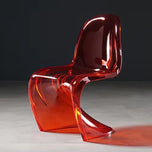 Sora Dining Chair in translucent red acrylic with a wavy, modern S-shape design.