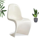Sora Dining Chair in white, featuring a single-piece, curved, S-shaped modern design.