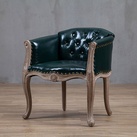 Willem Accent Chair: Dark green tufted leather accent chair with light wood frame and brass nailhead trim.