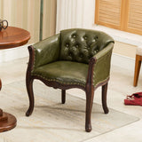 Willem Accent Chair: Green tufted leather accent chair with dark wood frame and nailhead trim.