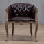 Willem Accent Chair in classic brown leather with tufted back, brass studs, and distressed light wood frame.