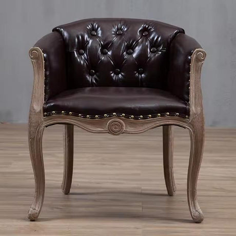 Willem Accent Chair in classic brown leather with tufted back, brass studs, and distressed light wood frame.