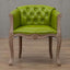 Willem Accent Chair in green apple leather with tufted back, nailhead trim, and carved light wood frame.