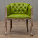 Willem Accent Chair in green apple leather with tufted back, nailhead trim, and carved light wood frame.