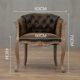 Willem Accent Chair: Brown tufted leather accent chair with light wood frame and cabriole legs. Dimensions shown.
