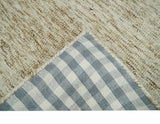 Beige and Ivory Modern Solid Hand Woven Wool Rug
