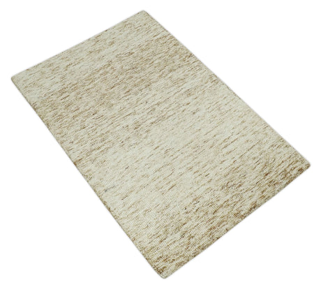 Beige and Ivory Modern Solid Hand Woven Wool Rug