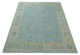 Blue and Beige Traditional Floral Hand Knotted Wool Rug