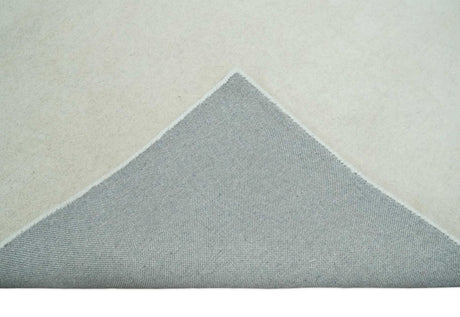 Custom Made Modern Solid Ivory Hand Tufted Wool Rug