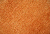 Custom Made orange Solid Woolen Hand Tufted contemporary area Rug
