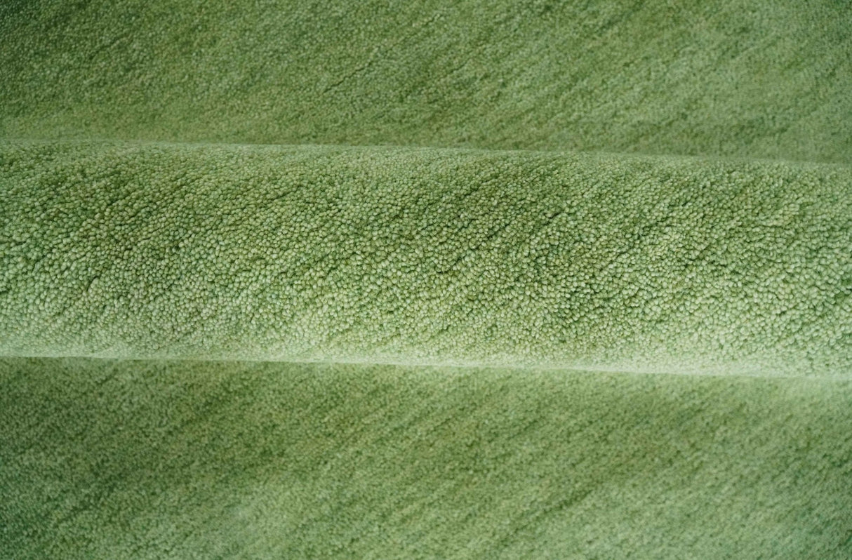 Custom Made solid Green Woolen Hand Tufted contemporary area Rug