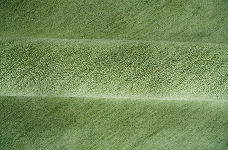Custom Made solid Green Woolen Hand Tufted contemporary area Rug