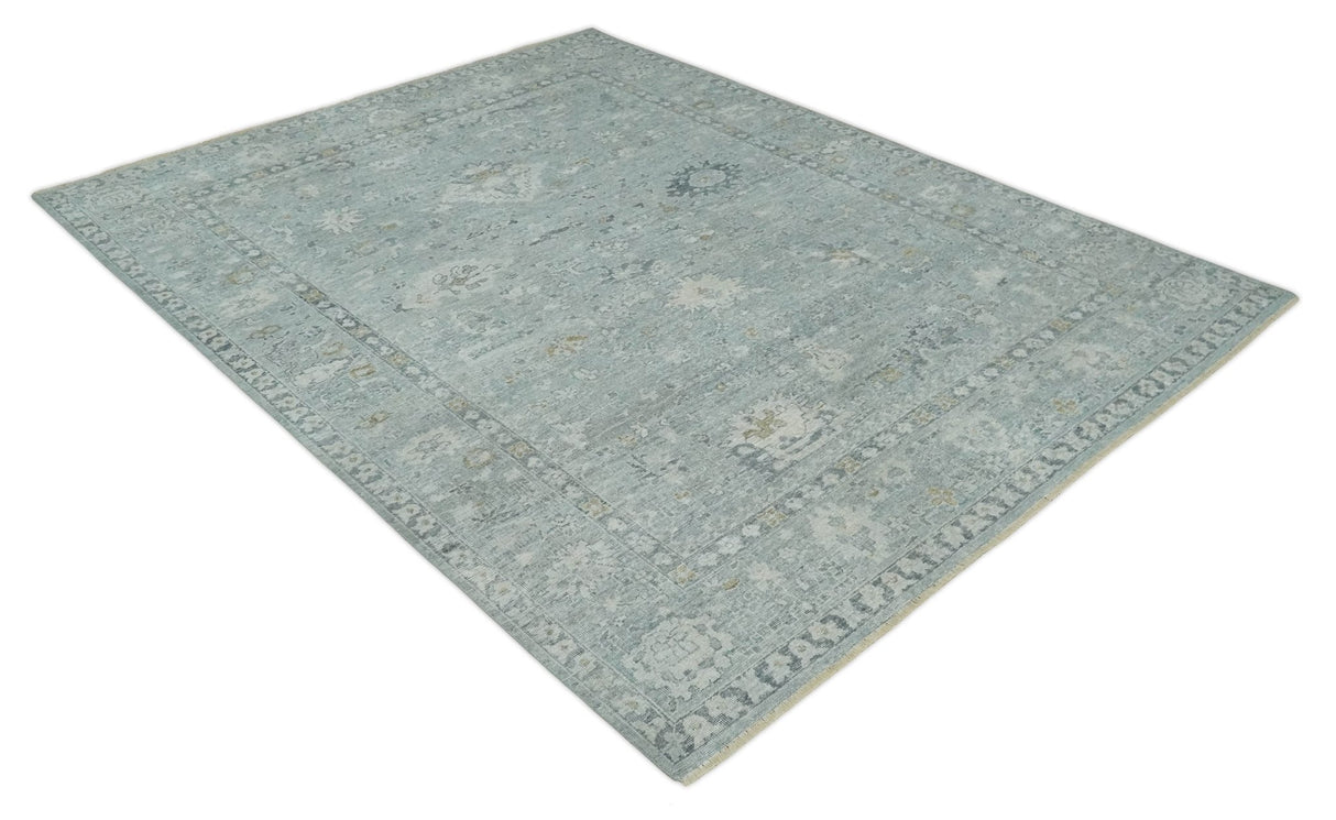 Distressed finished 8x10 Gray and Silver Low Pile wool Rug